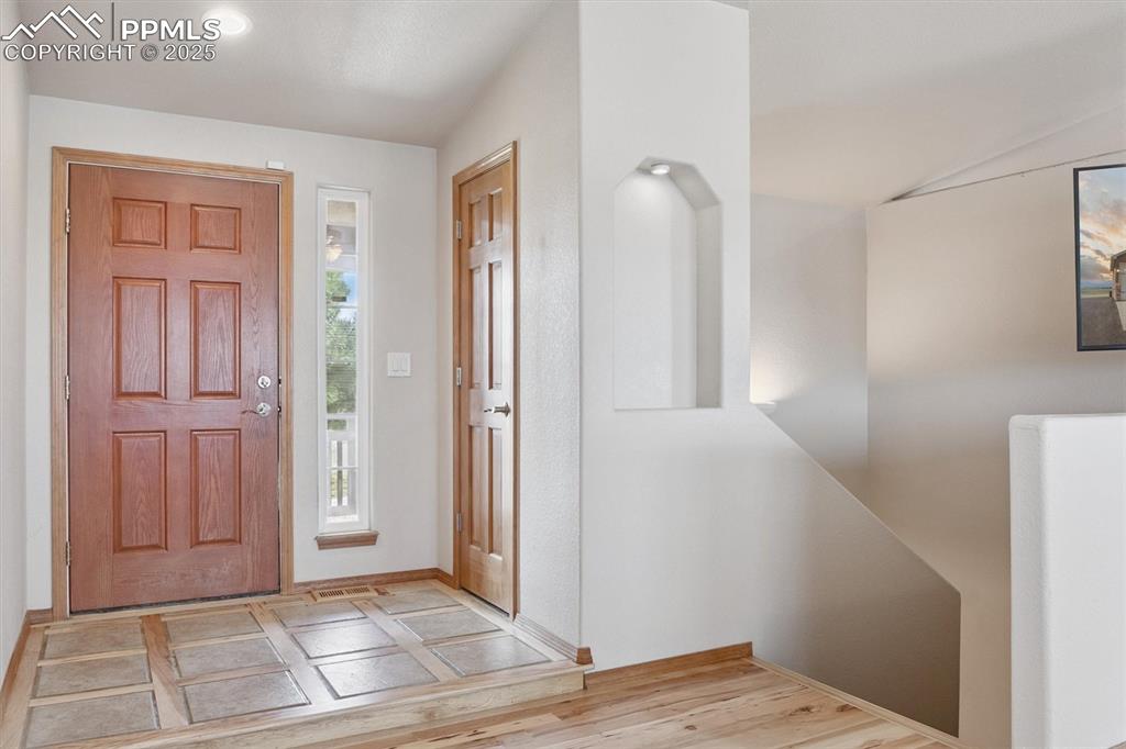 Image 8 of 42: Entrance foyer with entry closet