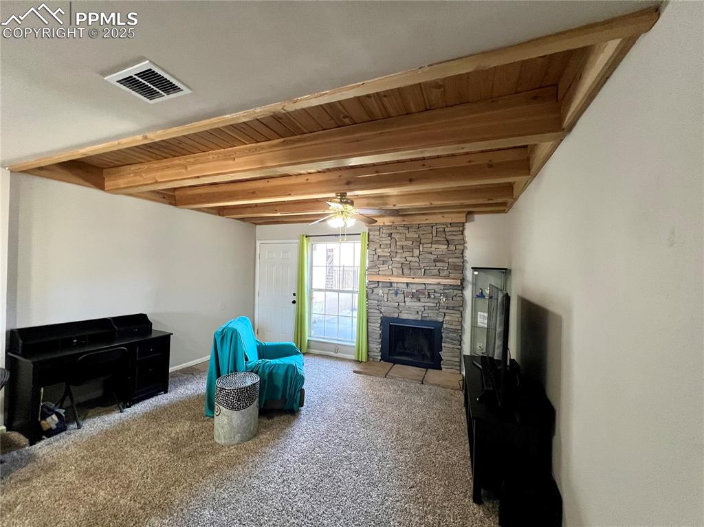 Image 4 of 24: Living Room with wood fireplace