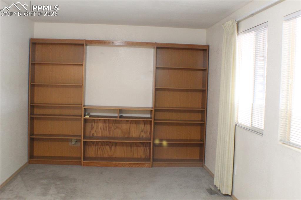 Image 13 of 23: Bedroom