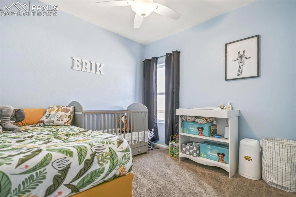 Image 14 of 21: Bedroom