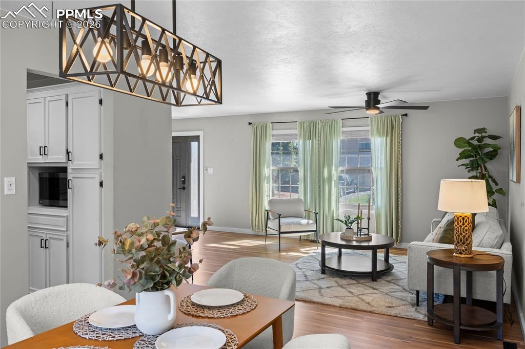 Image 12 of 50: Elegant open-concept dining area that serves as the heart of the home. Anch