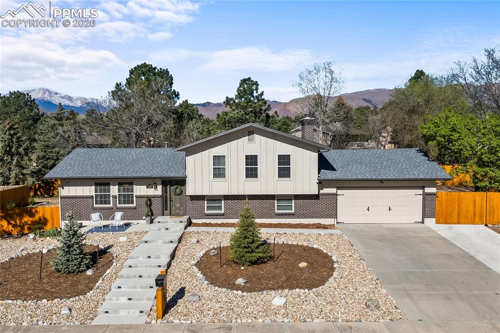 Image 3 of 50: Perched in the most secluded loop of Rockrimmon, this 4-level estate offers