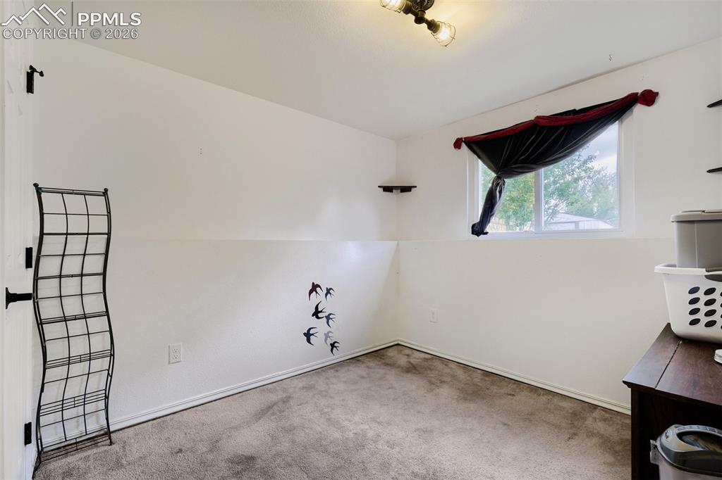 Image 21 of 28: Wood-finish flooring throughout