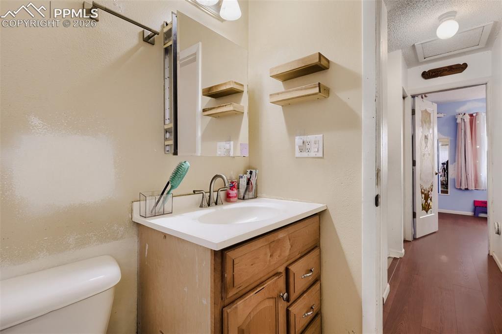 Image 25 of 28: Carpeted interior space with white walls and a white ceiling