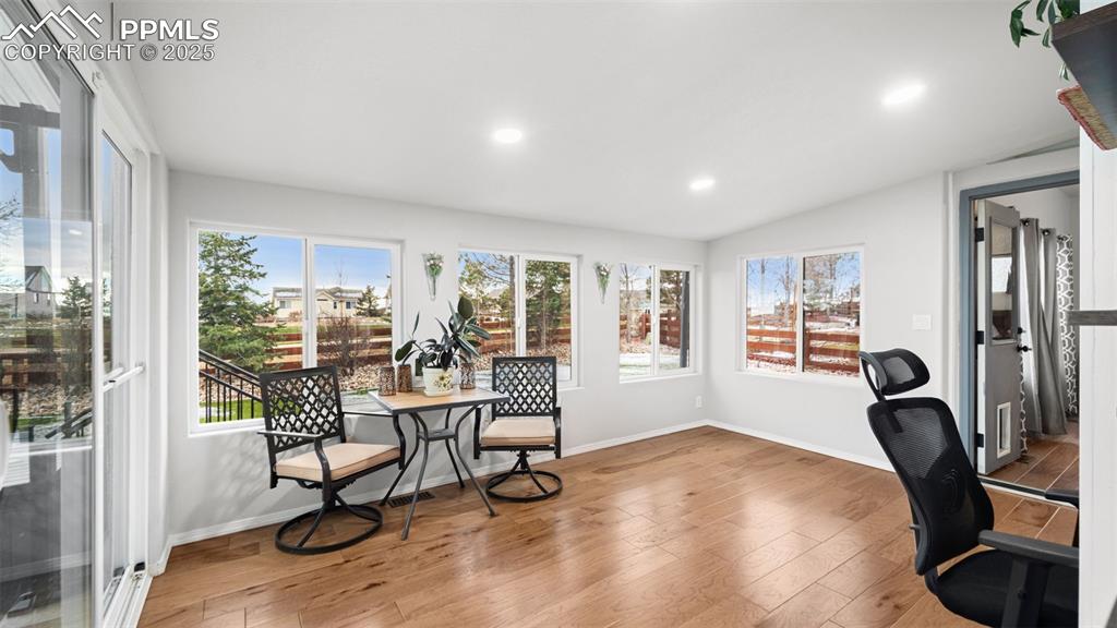 Image 17 of 42: Office featuring light wood finished floors, recessed lighting, and healthy