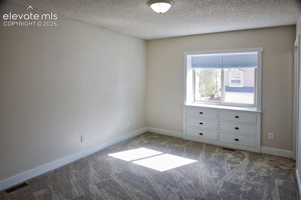 Image 15 of 39: Master bedroom