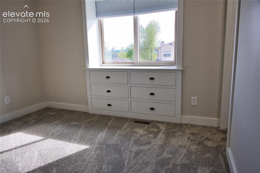 Image 16 of 39: Master bedroom