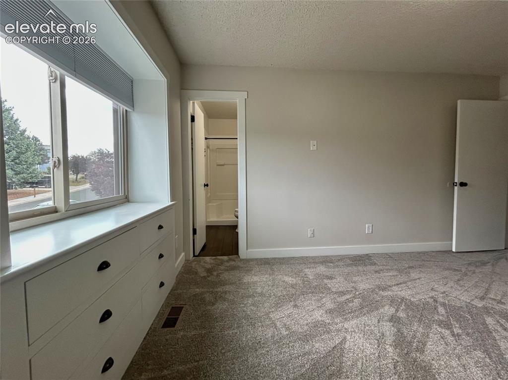 Image 17 of 39: Master bedroom