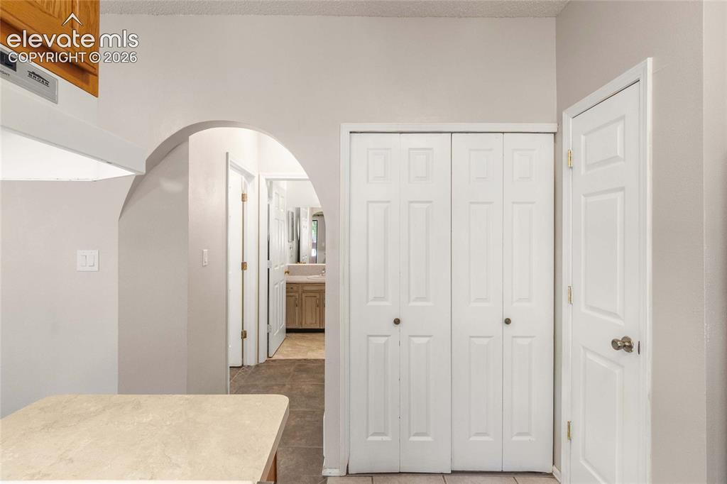 Image 20 of 32: Laundry Space Doors