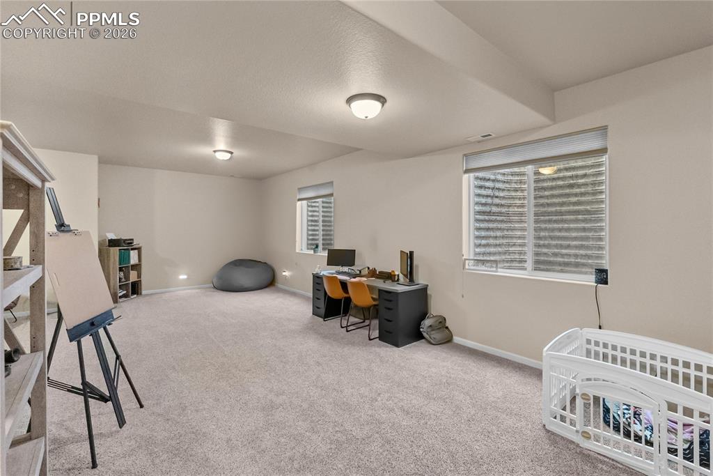 Image 26 of 41: Full bathroom with granite vanity.