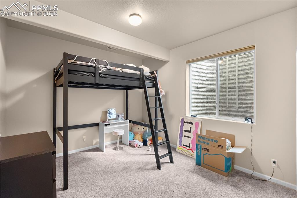 Image 28 of 41: Basement family room.