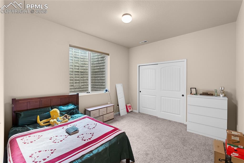 Image 29 of 41: Basement family room.