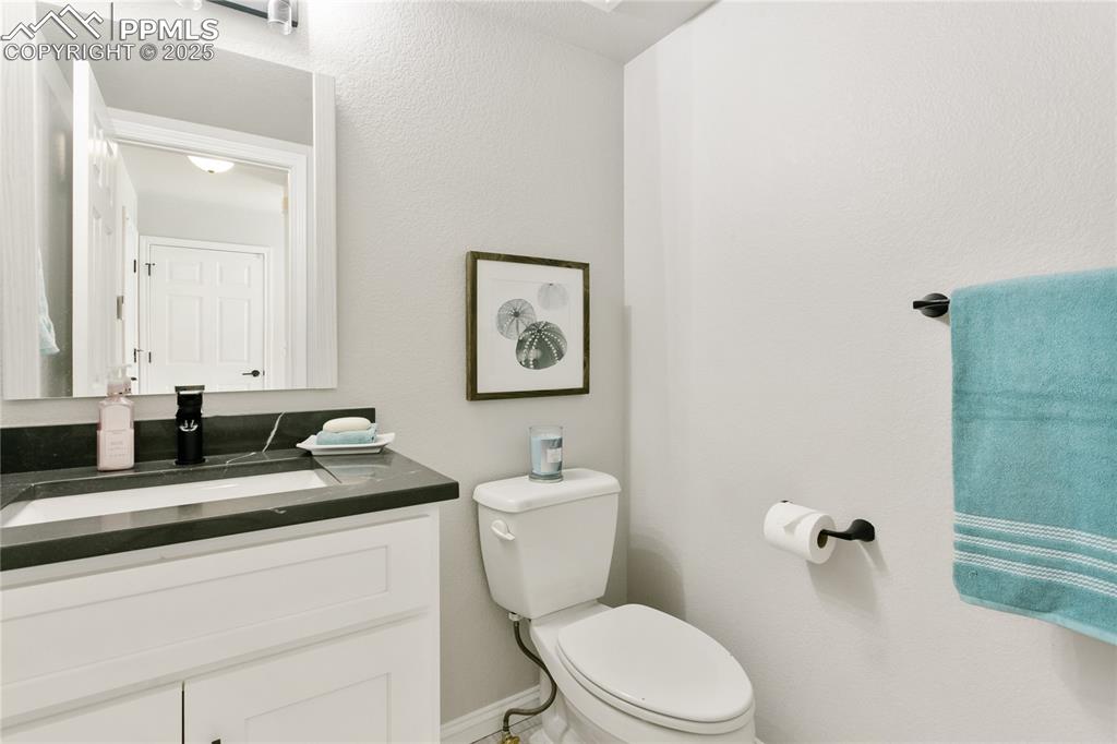 Image 23 of 48: Updated 1/2 bath on main
