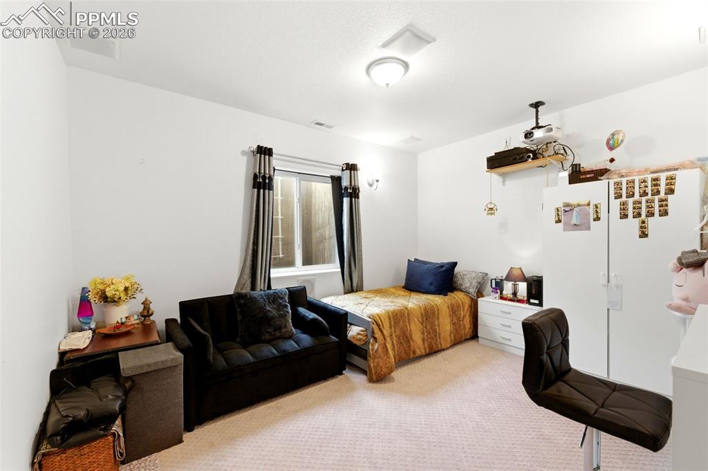 Image 22 of 35: Bedroom