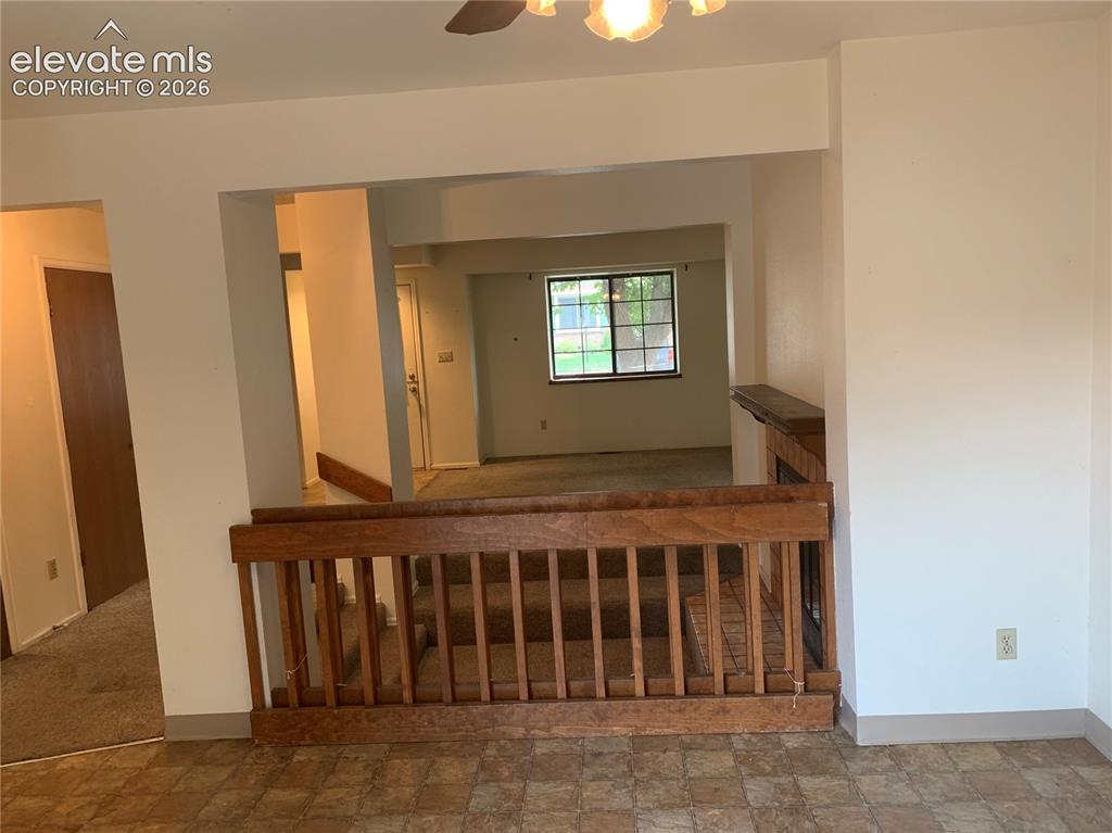 Image 16 of 27: Dining room looking into open living space.