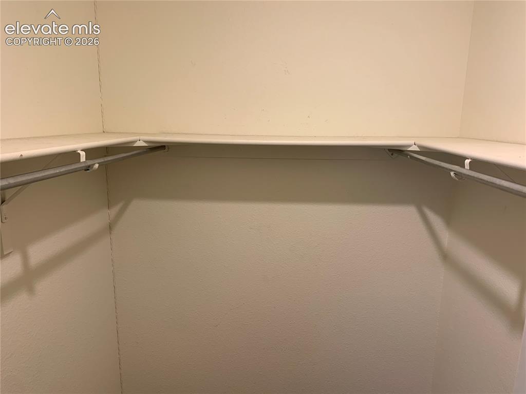 Image 25 of 27: Walk in closet.