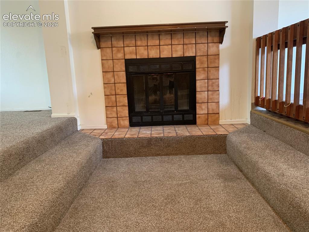 Image 5 of 27: Fireplace.