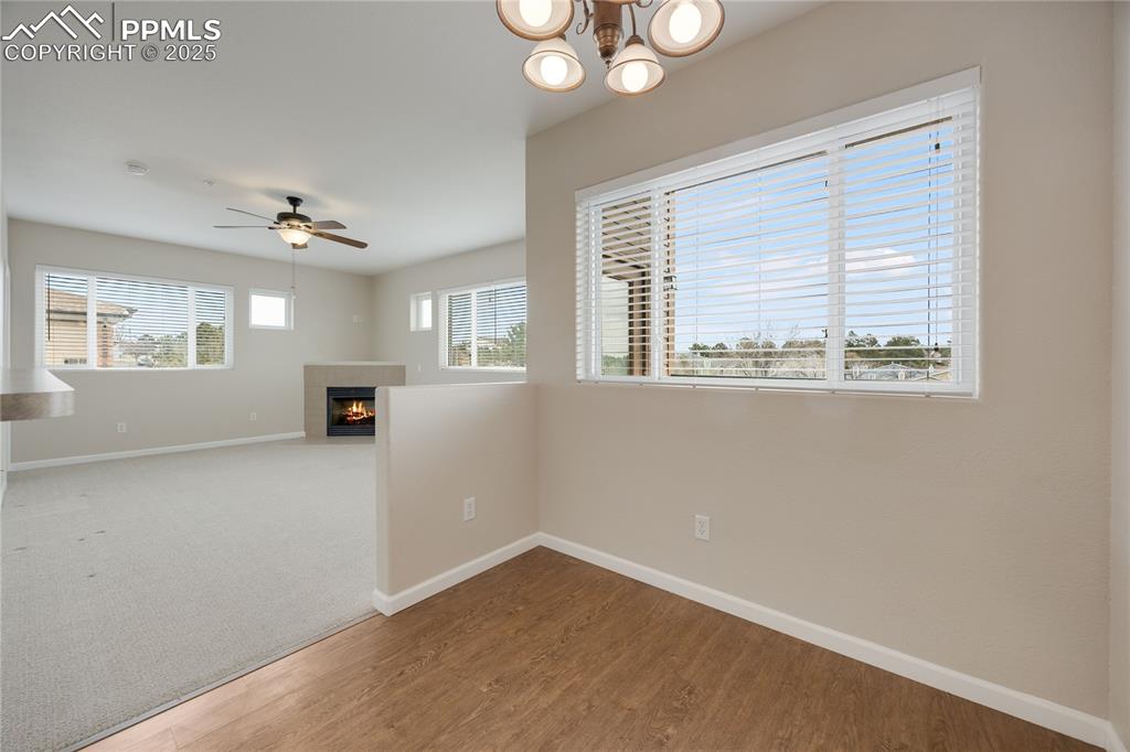 Image 11 of 42: Dining options include a dining area and counter height bar