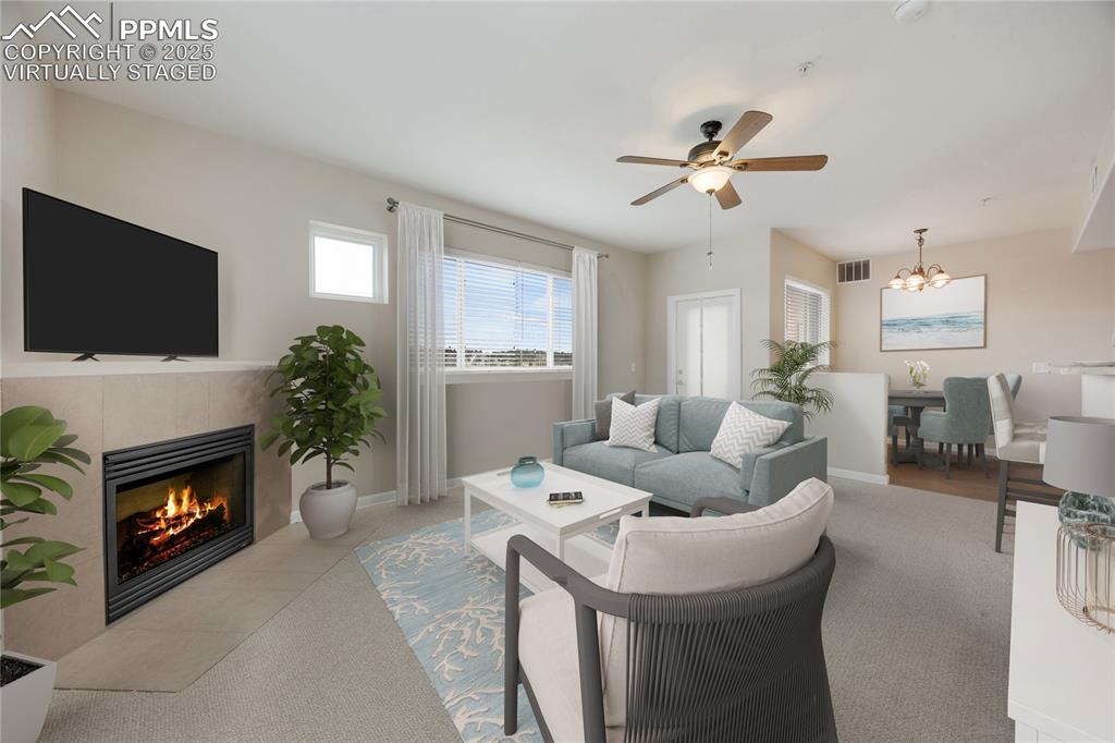 Image 13 of 42: Virtually staged to give viewer an idea of furnished living space