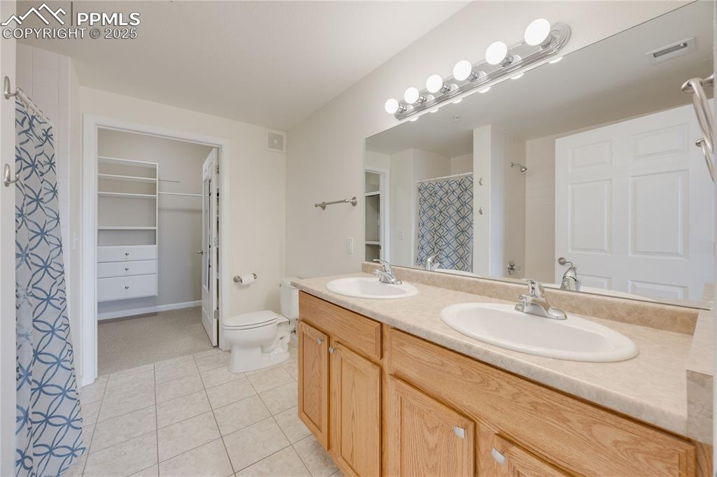 Image 23 of 42: 5-piece ensuite primary bathroom. Notice the extra-wide doors?