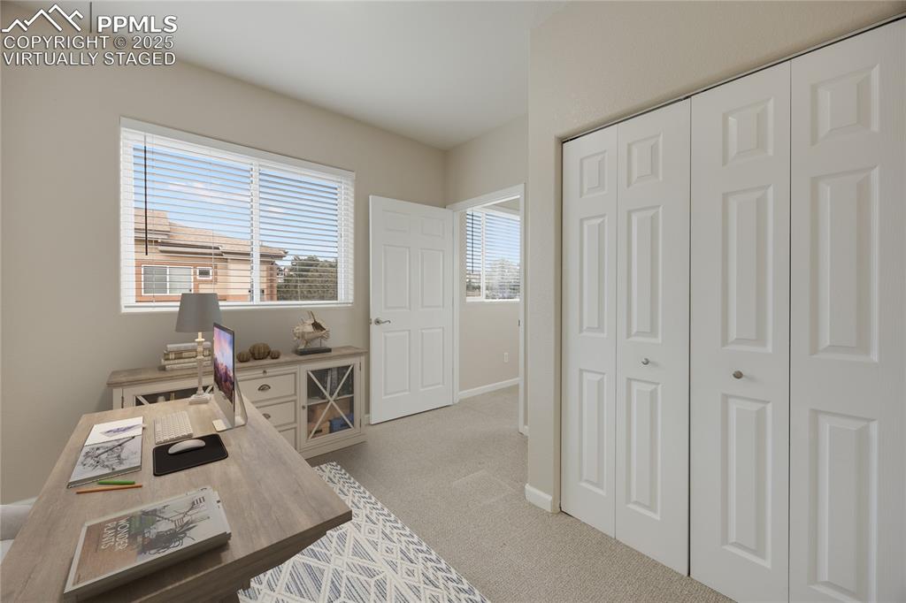 Image 27 of 42: Virtually staged to give viewer an idea of office layout