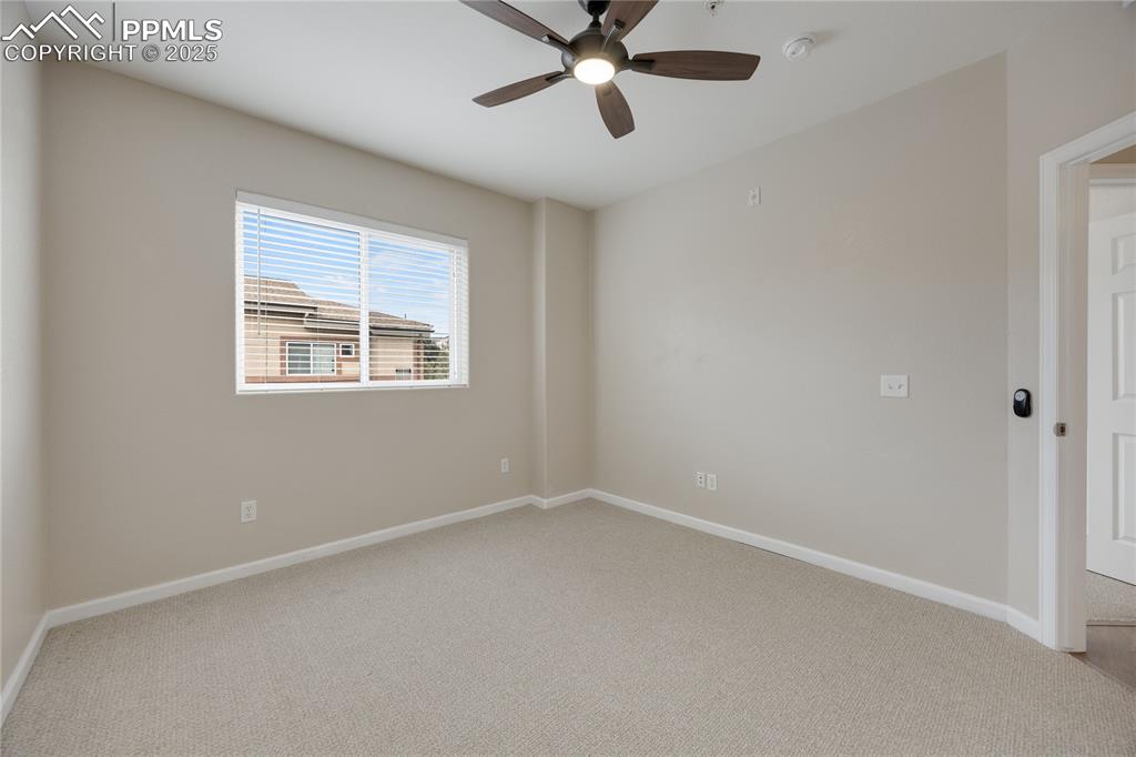Image 31 of 42: Another view of third bedroom