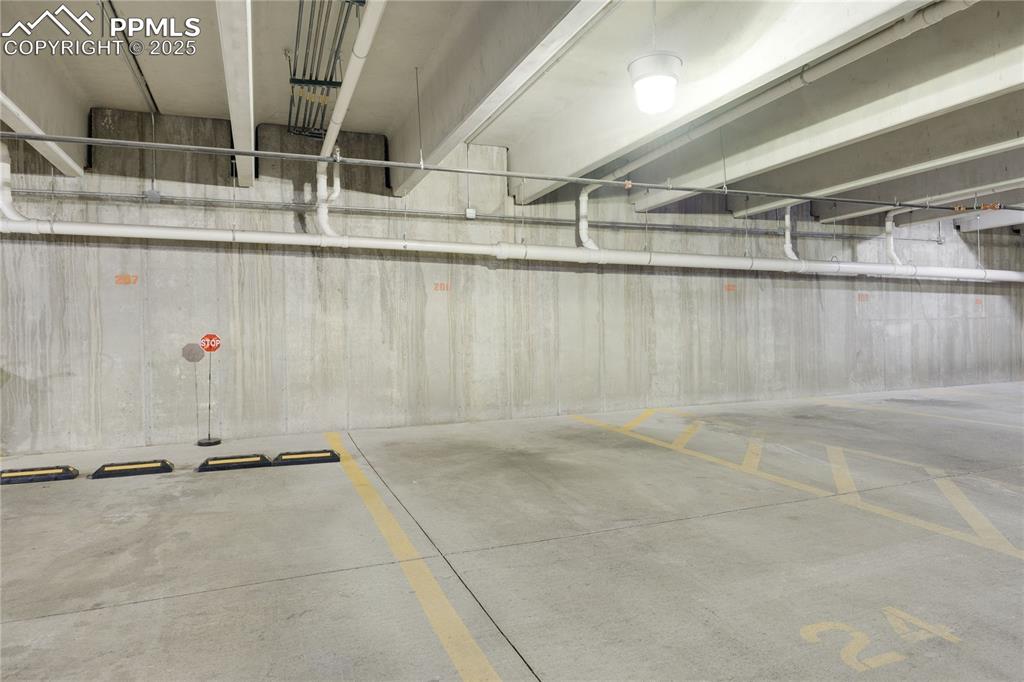 Image 39 of 42: Assigned parking space near elevator