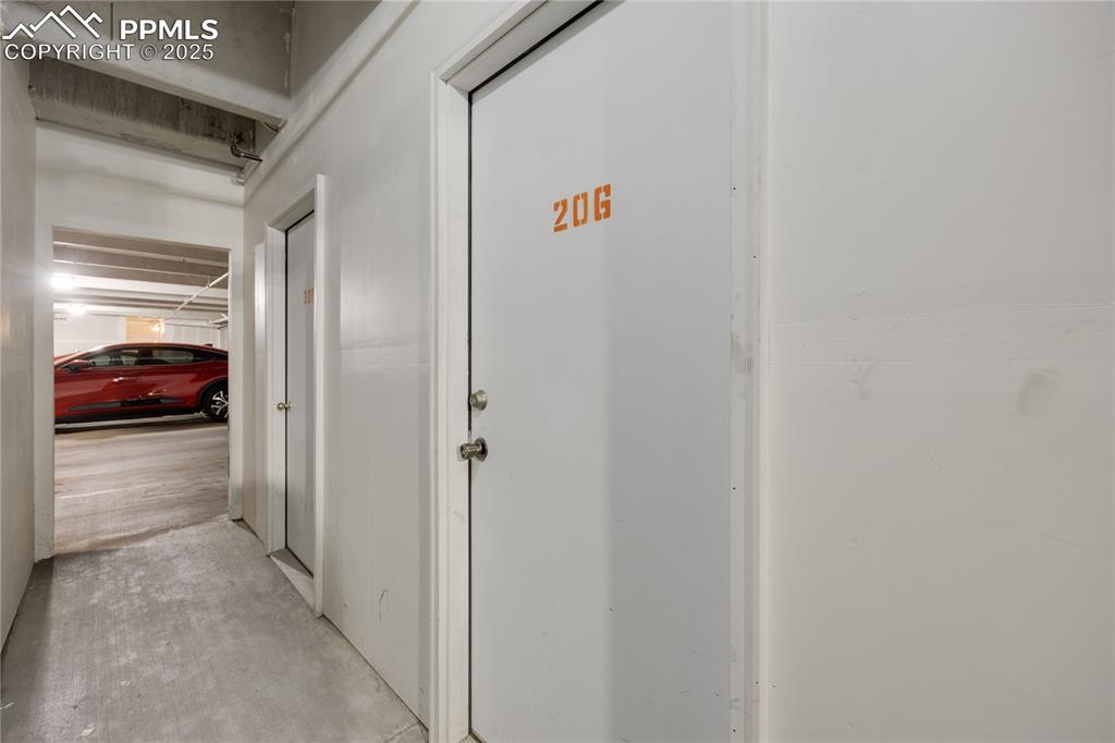 Image 40 of 42: Lockable storage a few feet from parking space