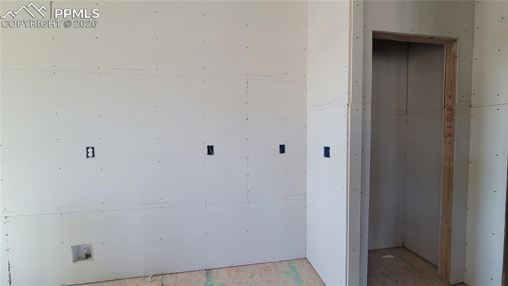 Image 11 of 33: Kitchen Pantry conveniently located!  Please, excuse our dust as this home 