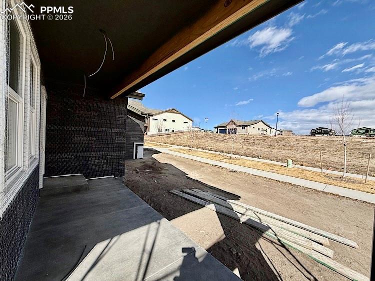 Image 30 of 33: Wraparound front porch!Please, excuse our dust as this home is currently un
