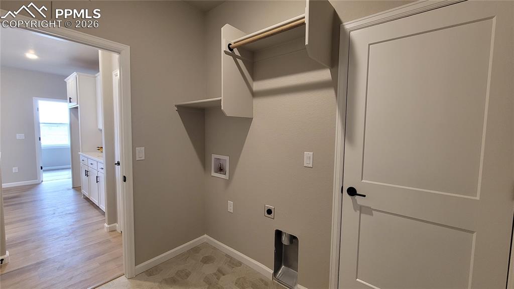 Image 36 of 50: Conveniently located laundry room!