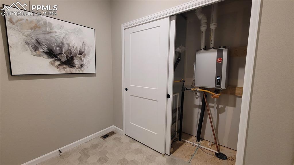 Image 38 of 50: 96% energy efficient furnace, conveniently located on the main level!