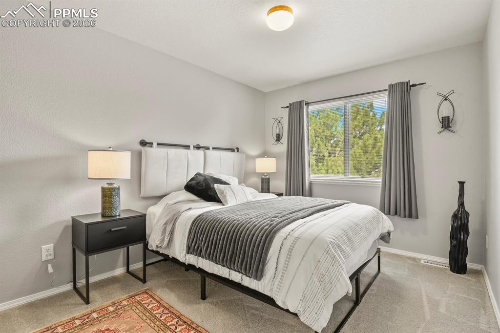 Image 23 of 36: 3rd bedroom upper level