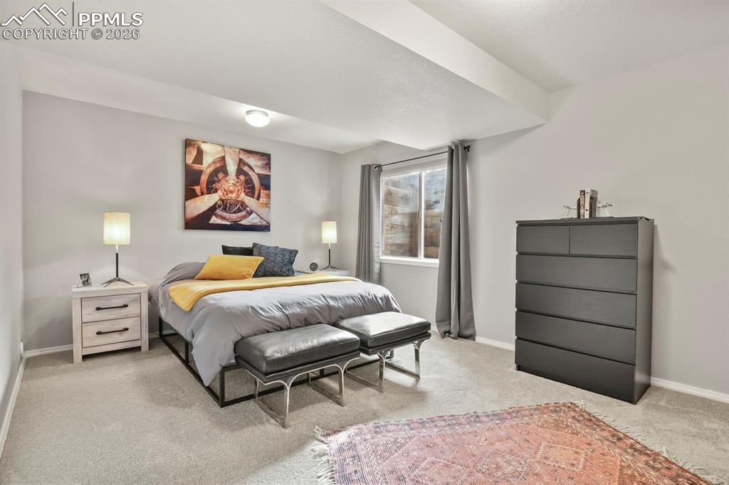 Image 29 of 36: 4th bedroom on basement level