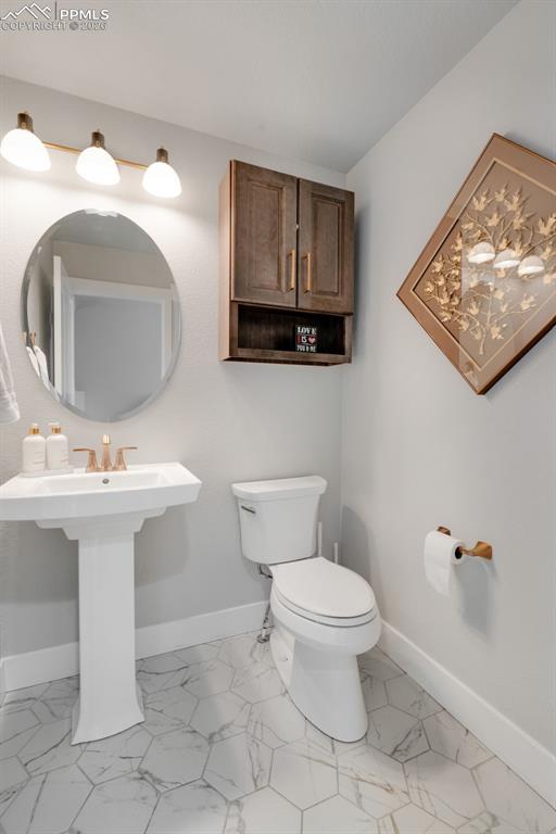 Image 25 of 50: Half Bath