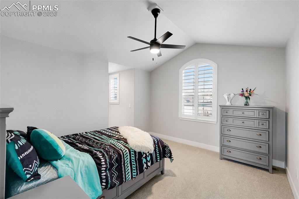 Image 27 of 50: Upper Bedroom w/Adjoining Bath