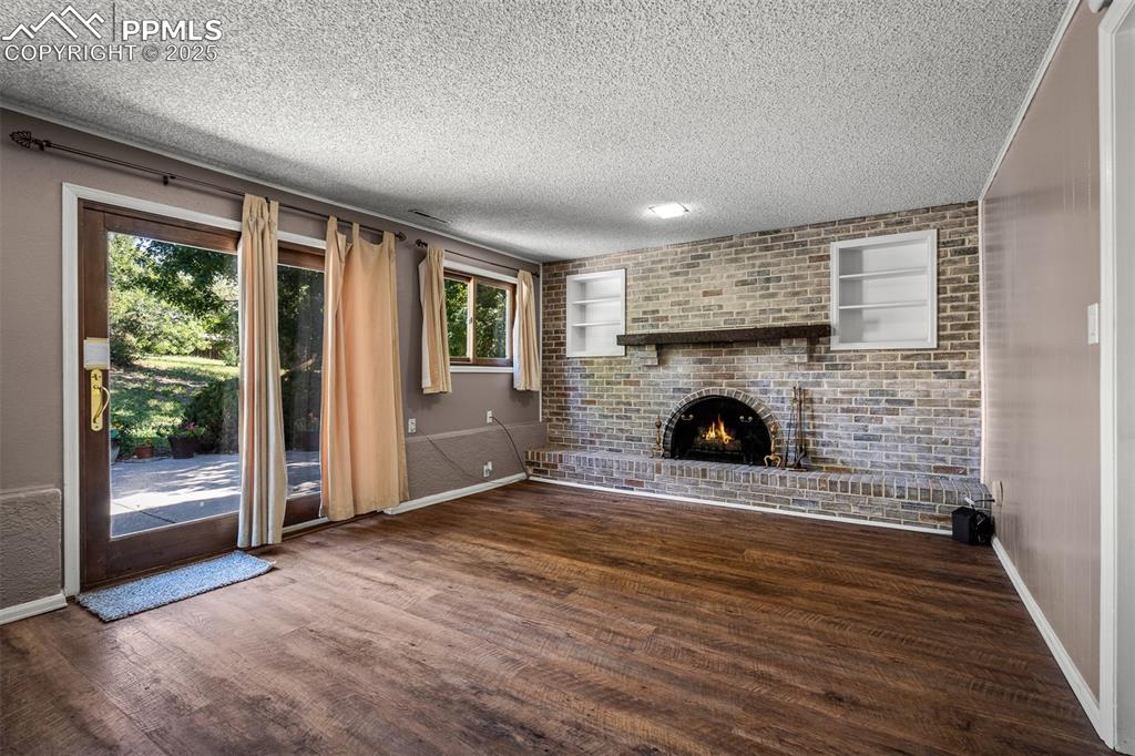 Image 31 of 49: Family room with walk out to patio and back yard.