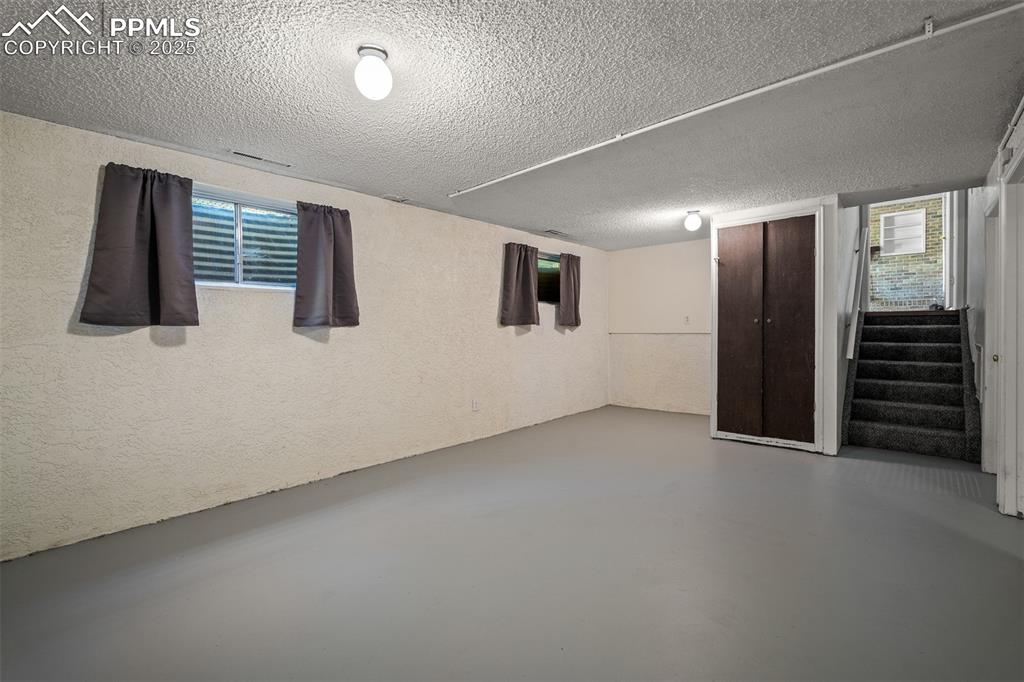 Image 46 of 49: Finished basement for rumpus room or gym