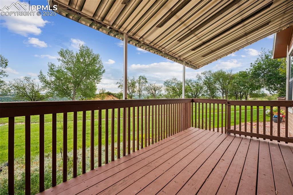 Image 17 of 27: Enjoy your morning coffee on the deck off of the primary bedroom