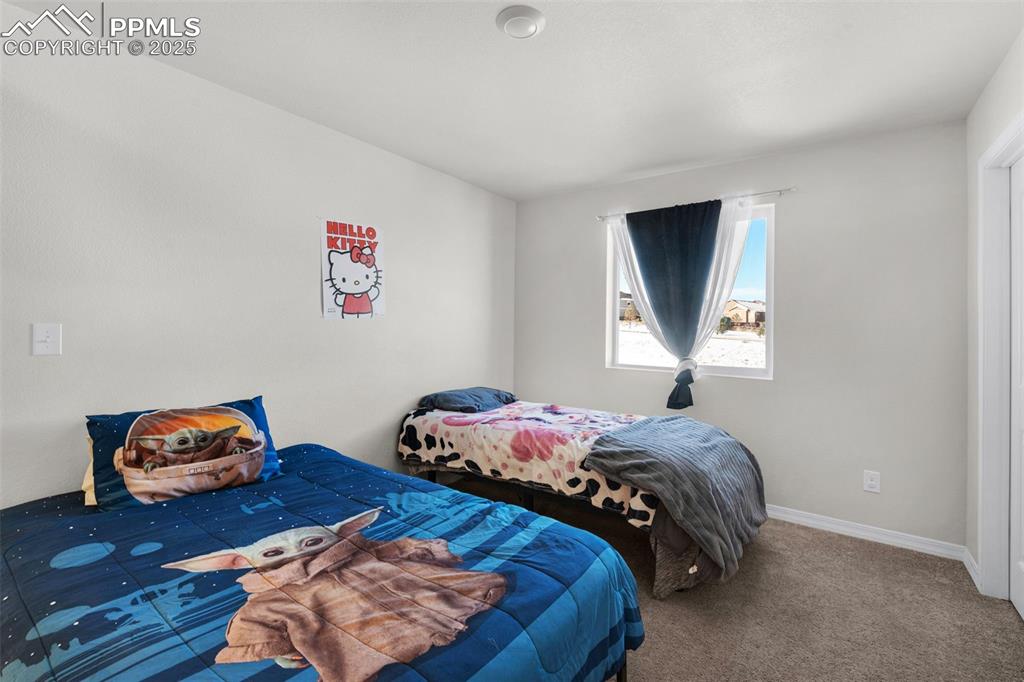 Image 19 of 38: Bedroom