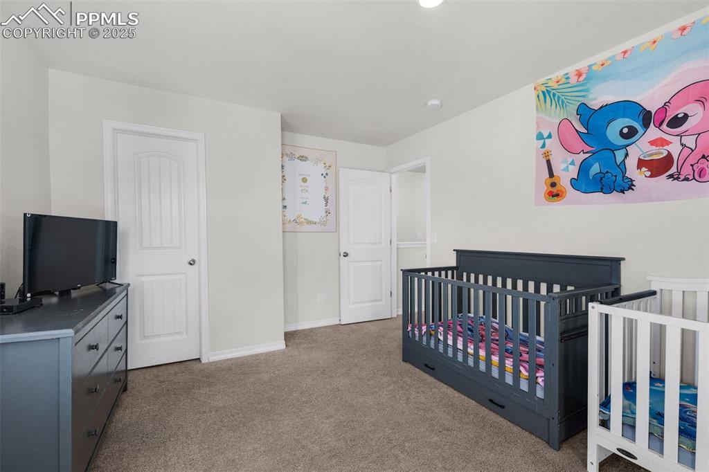 Image 21 of 38: Bedroom