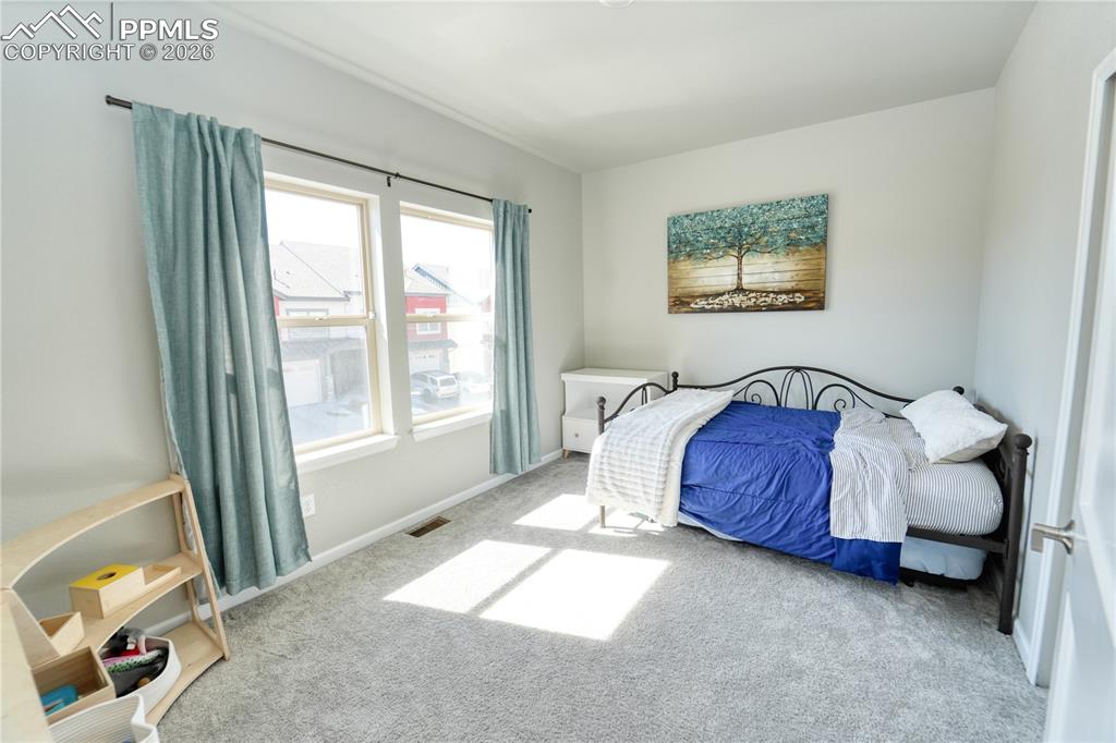 Image 20 of 26: Bedroom