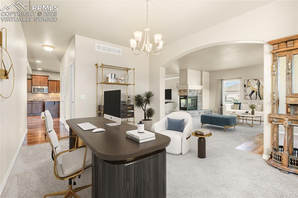 Image 10 of 34: Virtually Staged: This is the perfect formal dining area or office!