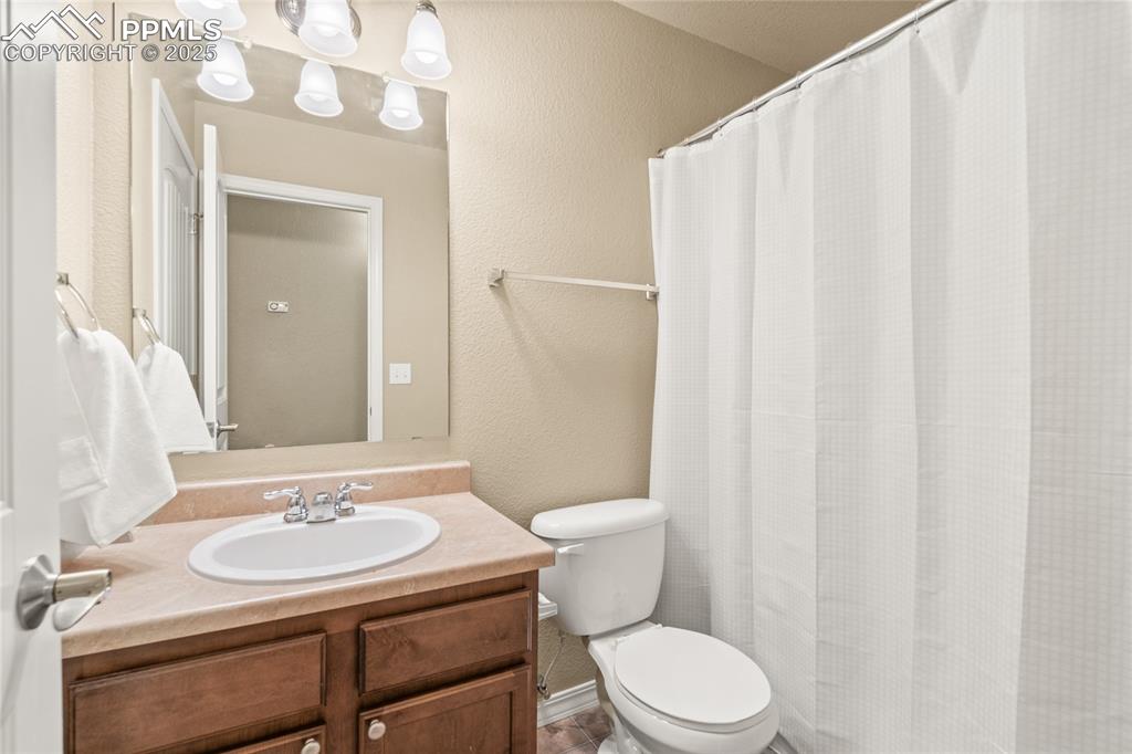 Image 23 of 34: The basement has a full bathroom.