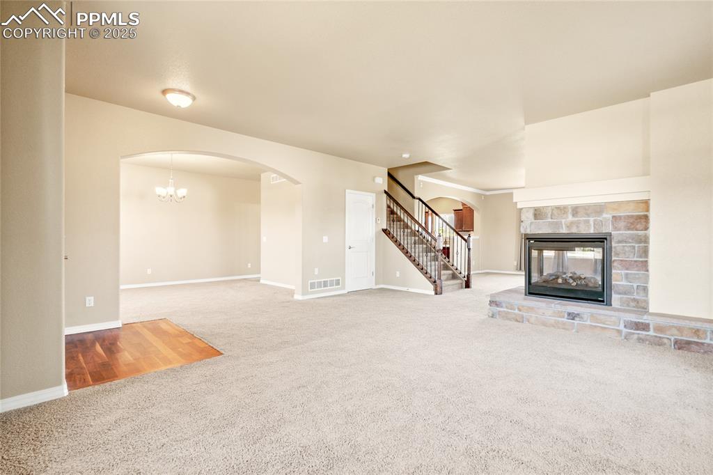 Image 8 of 34: There is a flex space to the left that can be an office or a formal dining