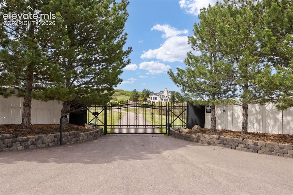 Image 38 of 38: ADU deck with expansive south-facing views of Castle Rock, the valley, and