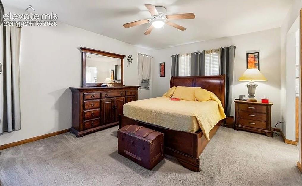 Image 10 of 20: Neutral-toned walls complement the light-colored carpeting