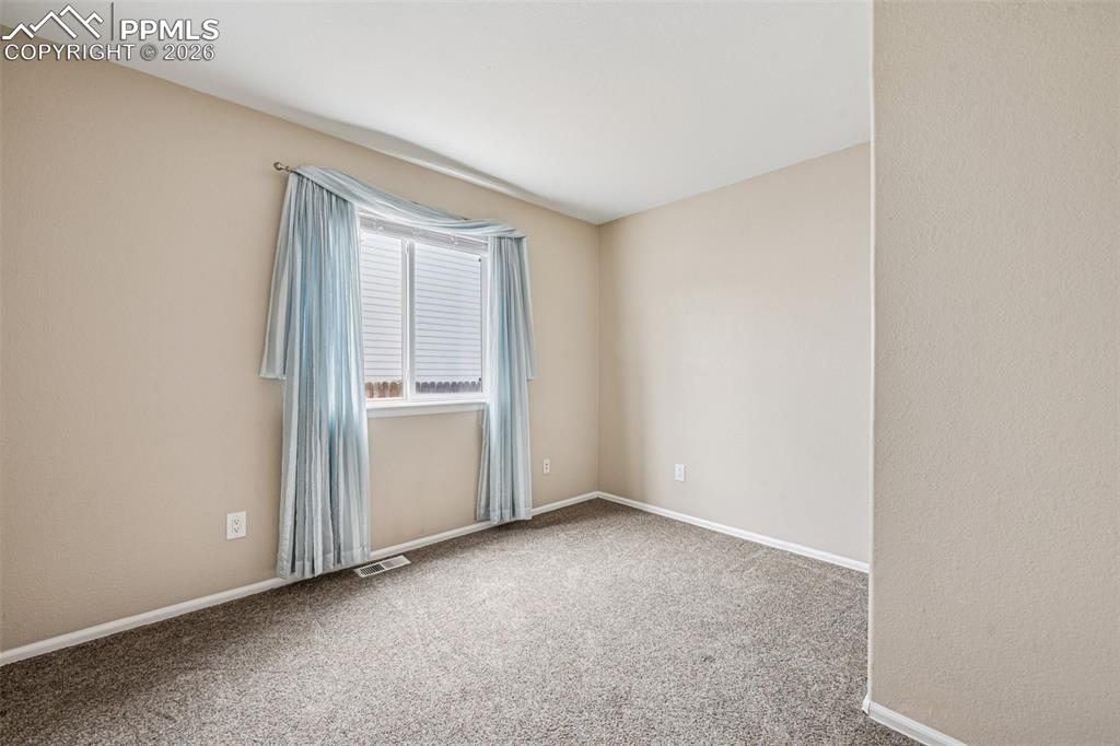 Image 18 of 39: 2nd bedroom main level