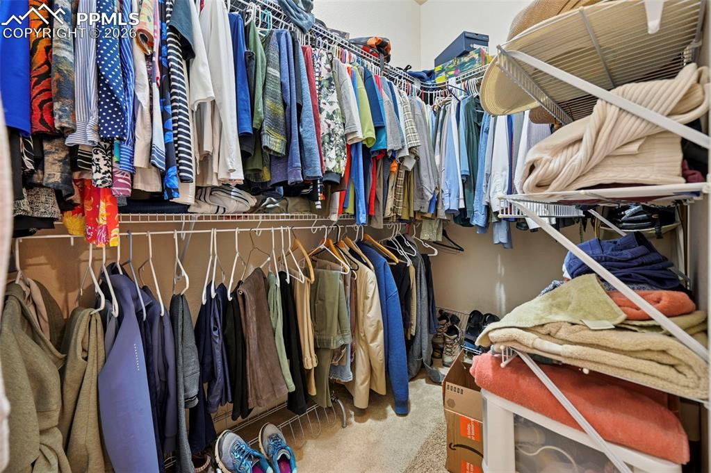 Image 11 of 45: Walk-In Closet in Primary Bedroom