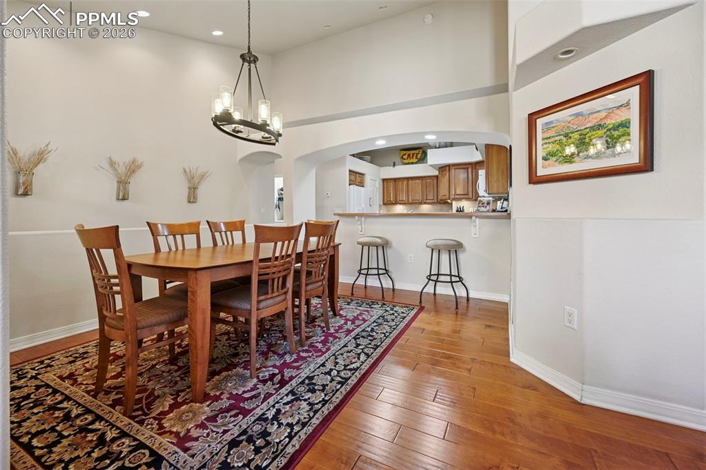 Image 14 of 45: Dining Room looking into the Kitchen